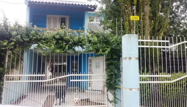 Foto 1 de Casa com 5 Quartos à venda, 385m² em Guarujá, Porto Alegre