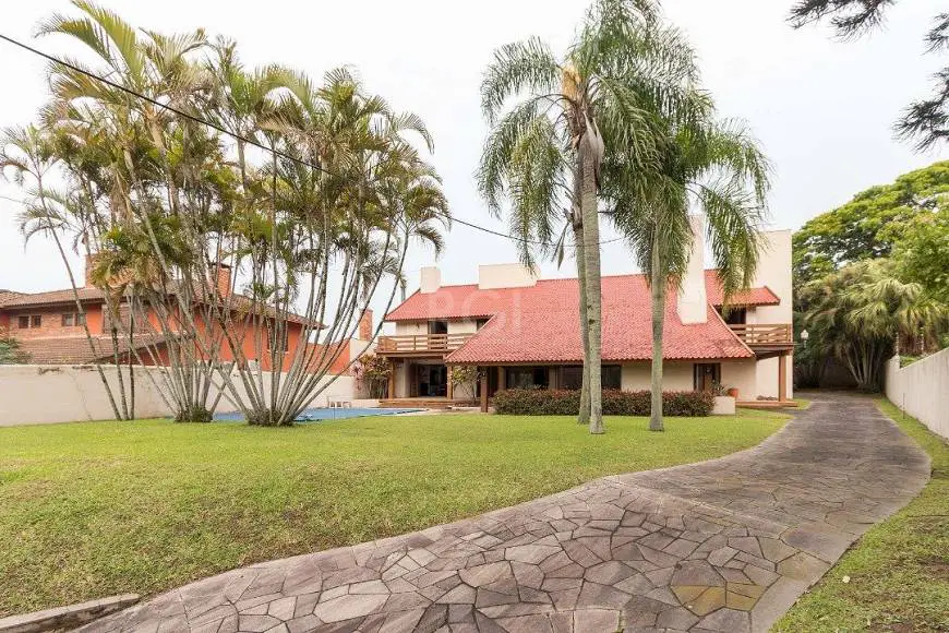 Foto 1 de Casa com 5 Quartos à venda, 542m² em Vila Assunção, Porto Alegre