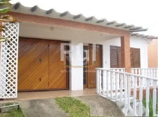 Foto 1 de Casa com 5 Quartos à venda, 218m² em Vila Nova, Porto Alegre