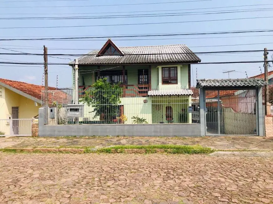 Foto 1 de Casa com 6 Quartos à venda, 279m² em Cavalhada, Porto Alegre
