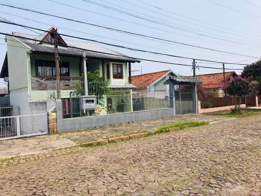 Foto 2 de Casa com 6 Quartos à venda, 279m² em Cavalhada, Porto Alegre