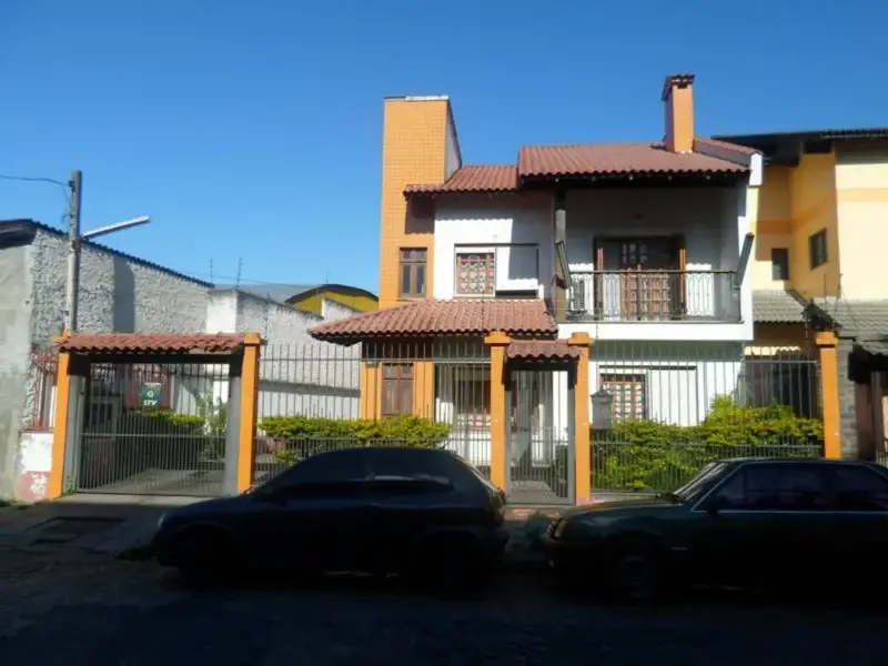 Foto 1 de Casa com 6 Quartos à venda, 400m² em Santo Antônio, Porto Alegre