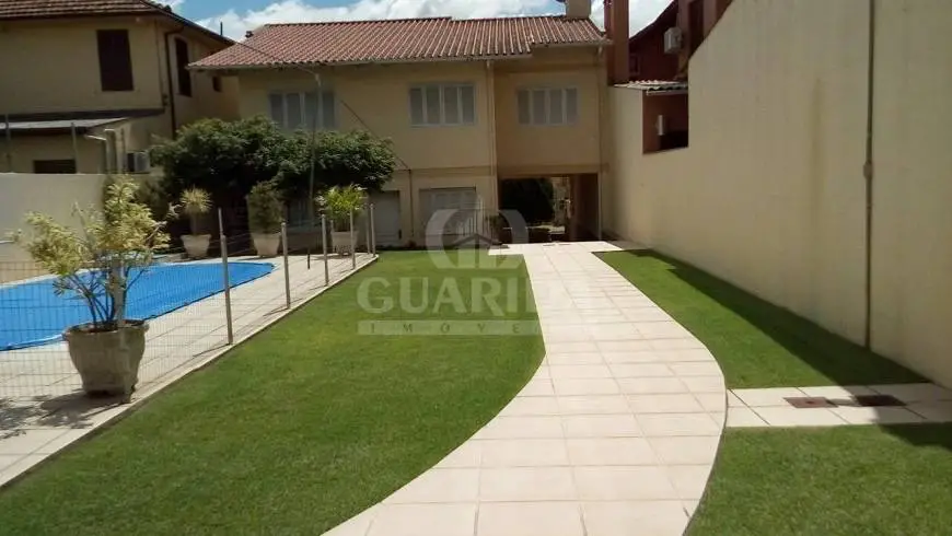 Foto 3 de Casa com 8 Quartos à venda, 433m² em Medianeira, Porto Alegre