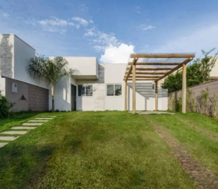 Foto 1 de Casa de Condomínio com 3 Quartos à venda, 79m² em Laranjeiras, Uberlândia