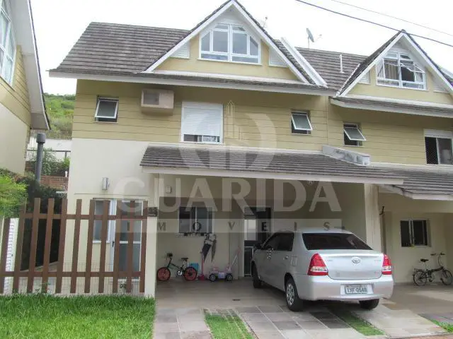 Foto 1 de Casa de Condomínio com 3 Quartos à venda, 241m² em Teresópolis, Porto Alegre