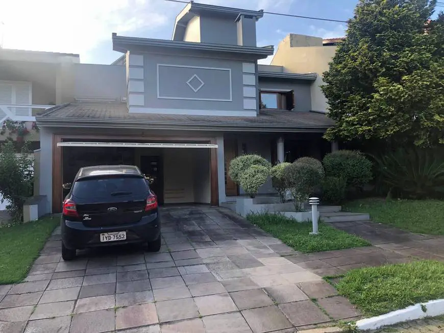Foto 1 de Casa de Condomínio com 4 Quartos à venda, 280m² em Agronomia, Porto Alegre