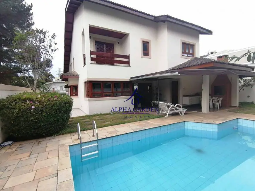 Foto 1 de Casa de Condomínio com 4 Quartos para venda ou aluguel, 450m² em Alphaville Residencial 1, Barueri