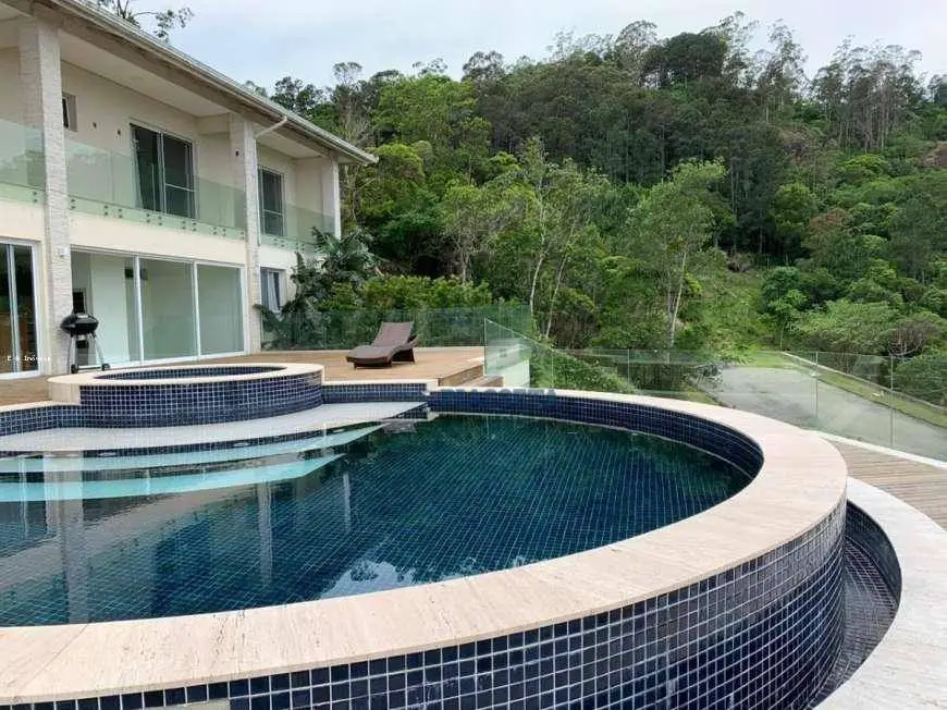 Foto 1 de Casa de Condomínio com 4 Quartos à venda, 1228m² em Cacupé, Florianópolis