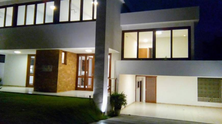 Foto 1 de Casa de Condomínio com 4 Quartos à venda, 459m² em Centro, Lauro de Freitas