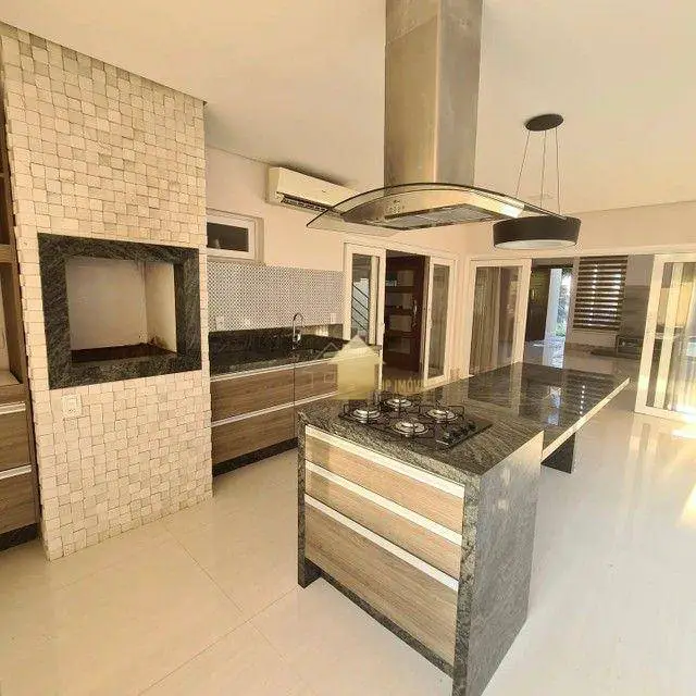 Foto 4 de Casa de Condomínio com 4 Quartos à venda, 316m² em Condomínio Residencial Florais dos Lagos , Cuiabá
