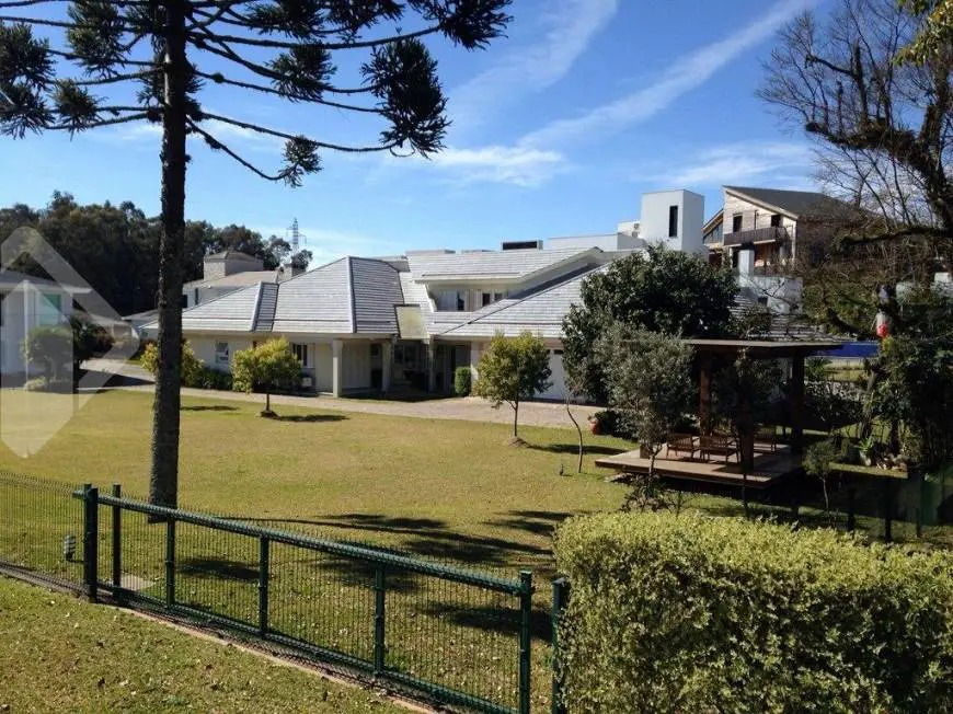 Foto 2 de Casa de Condomínio com 4 Quartos à venda, 470m² em Nossa Senhora da Saúde, Caxias do Sul