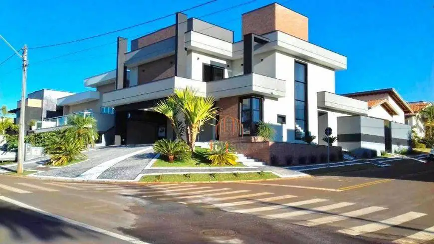 Foto 1 de Casa de Condomínio com 4 Quartos à venda, 300m² em Residencial Terras do Cancioneiro, Paulínia