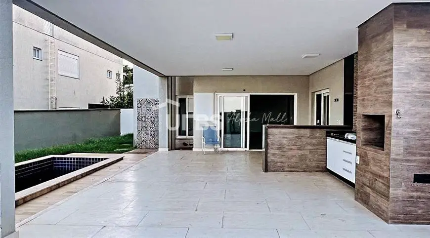 Foto 4 de Casa de Condomínio com 5 Quartos à venda, 400m² em Alphaville Flamboyant Residencial Araguaia, Goiânia
