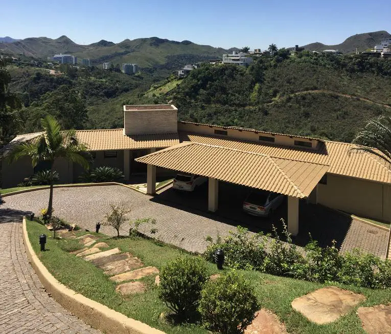 Foto 1 de Casa de Condomínio com 6 Quartos à venda, 710m² em Vila del Rey, Nova Lima