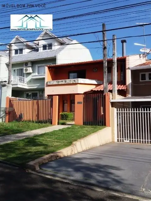 Foto 1 de Sobrado com 3 Quartos à venda, 185m² em Santo Inácio, Curitiba