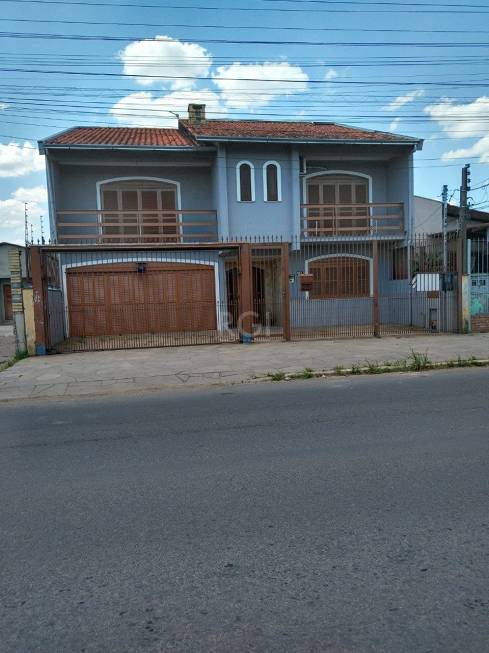 Foto 1 de Sobrado com 5 Quartos à venda, 200m² em Sumare, Alvorada