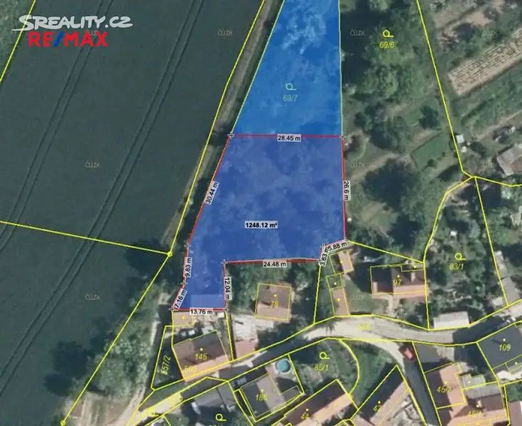 Prodej  stavebního pozemku 2 203 m², Slatina, okres Kladno