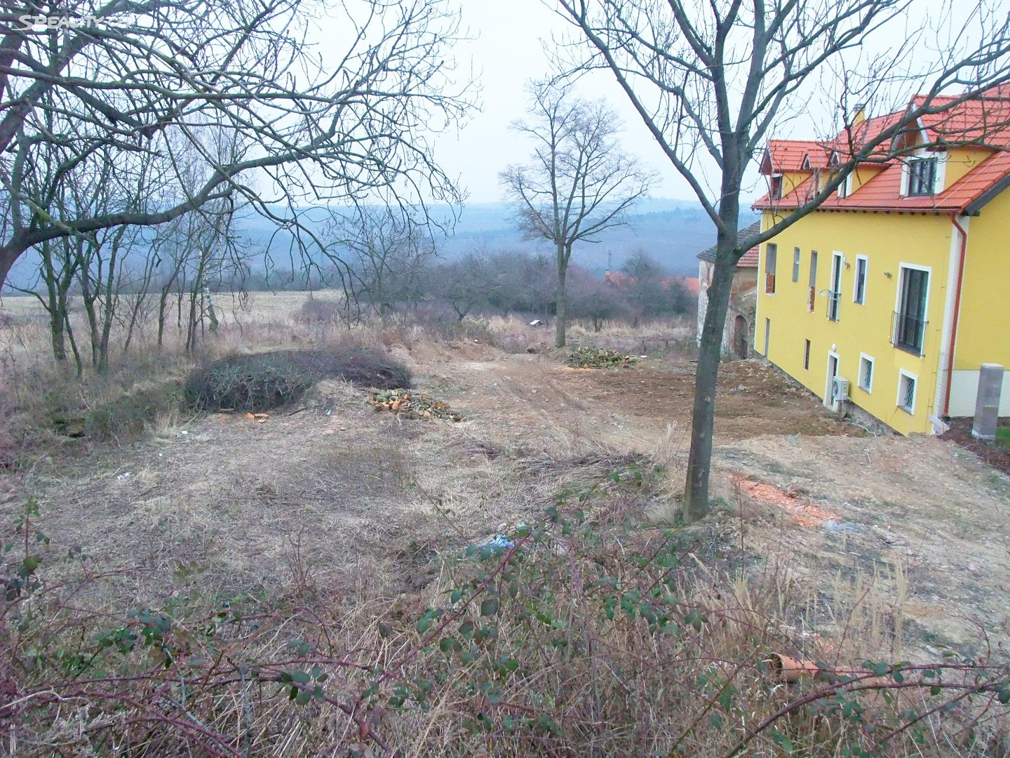 Prodej  stavebního pozemku 1 036 m², Nad Dvorem, Černolice