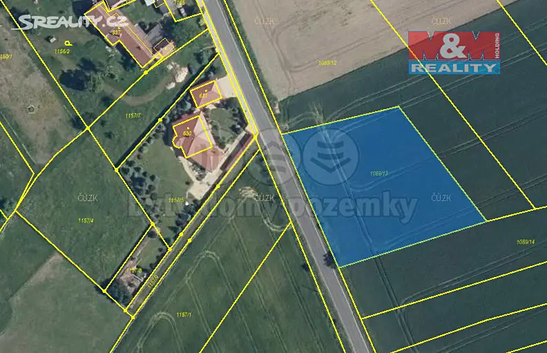 Prodej  stavebního pozemku 2 765 m², Bělušice, okres Kolín