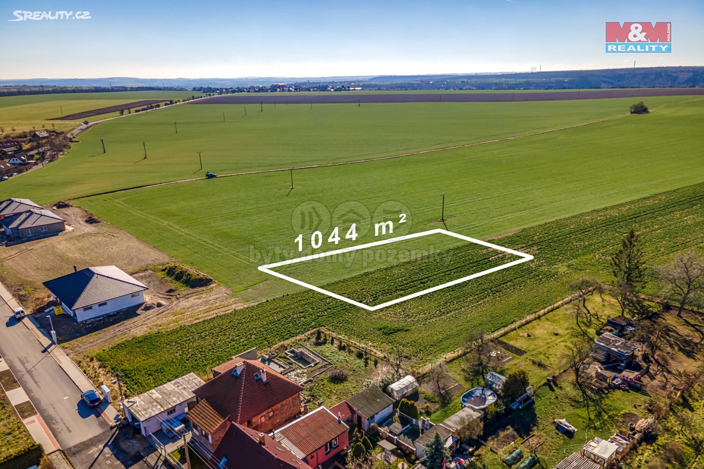 Prodej  stavebního pozemku 1 044 m², Kolmá, Pchery - Humny