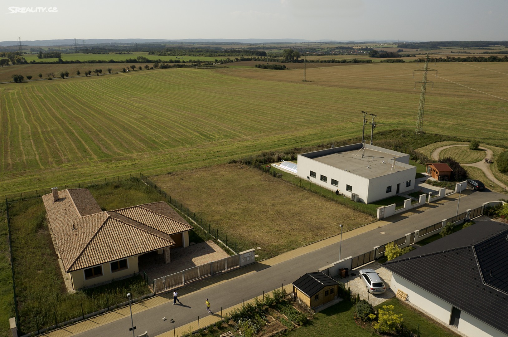 Prodej  stavebního pozemku 1 030 m², Slunečná, Zbuzany