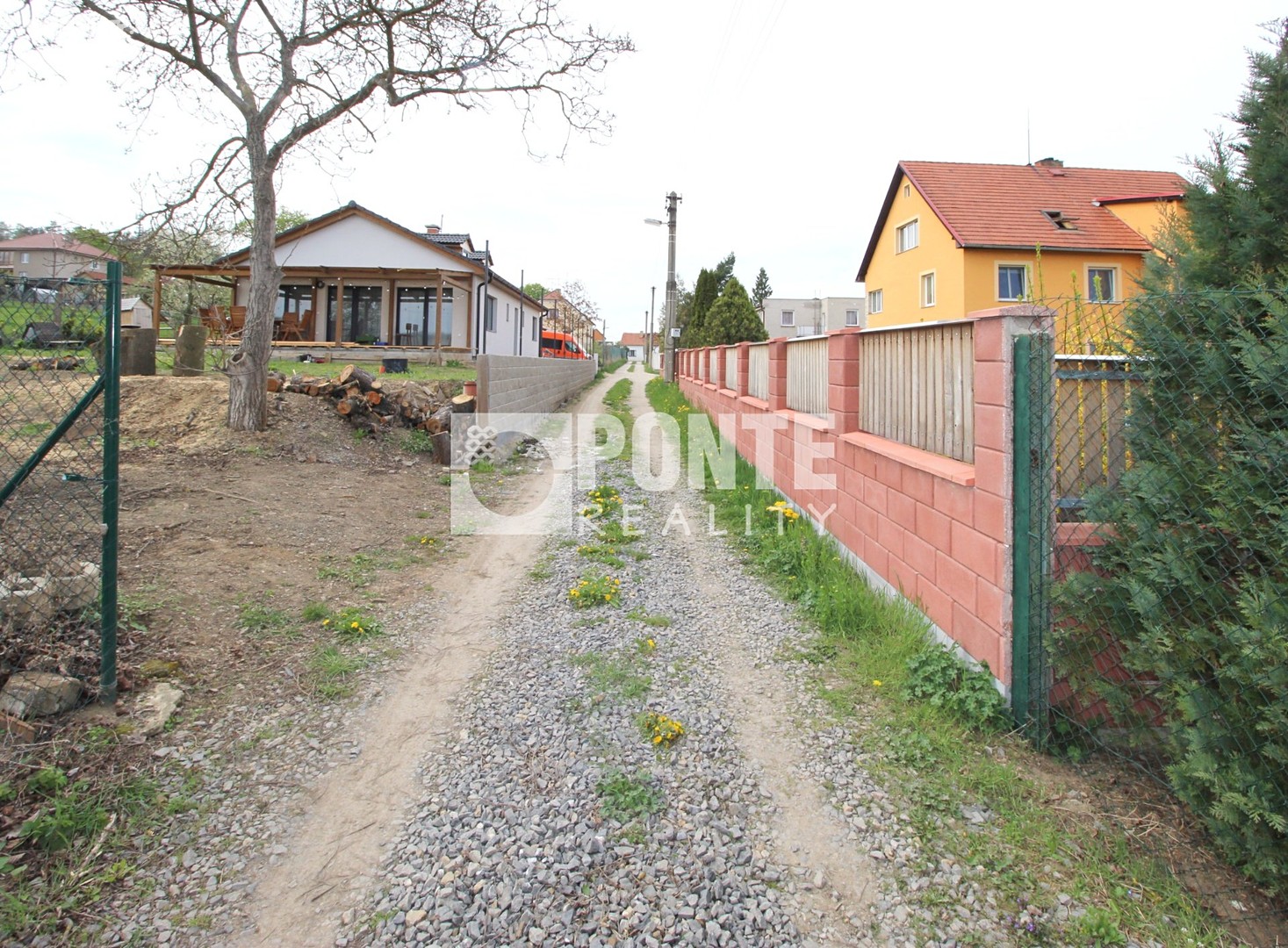 Prodej  stavebního pozemku 431 m², Pacovského, Liteň