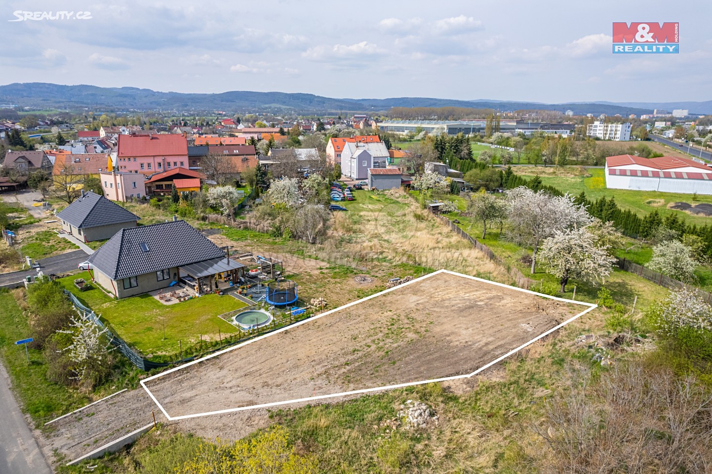 Prodej  stavebního pozemku 703 m², Spořice, okres Chomutov