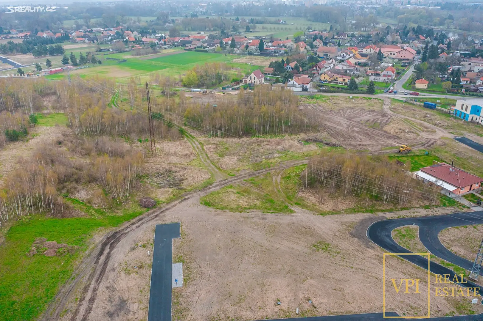 Prodej  stavebního pozemku 1 051 m², Káraný, okres Praha-východ