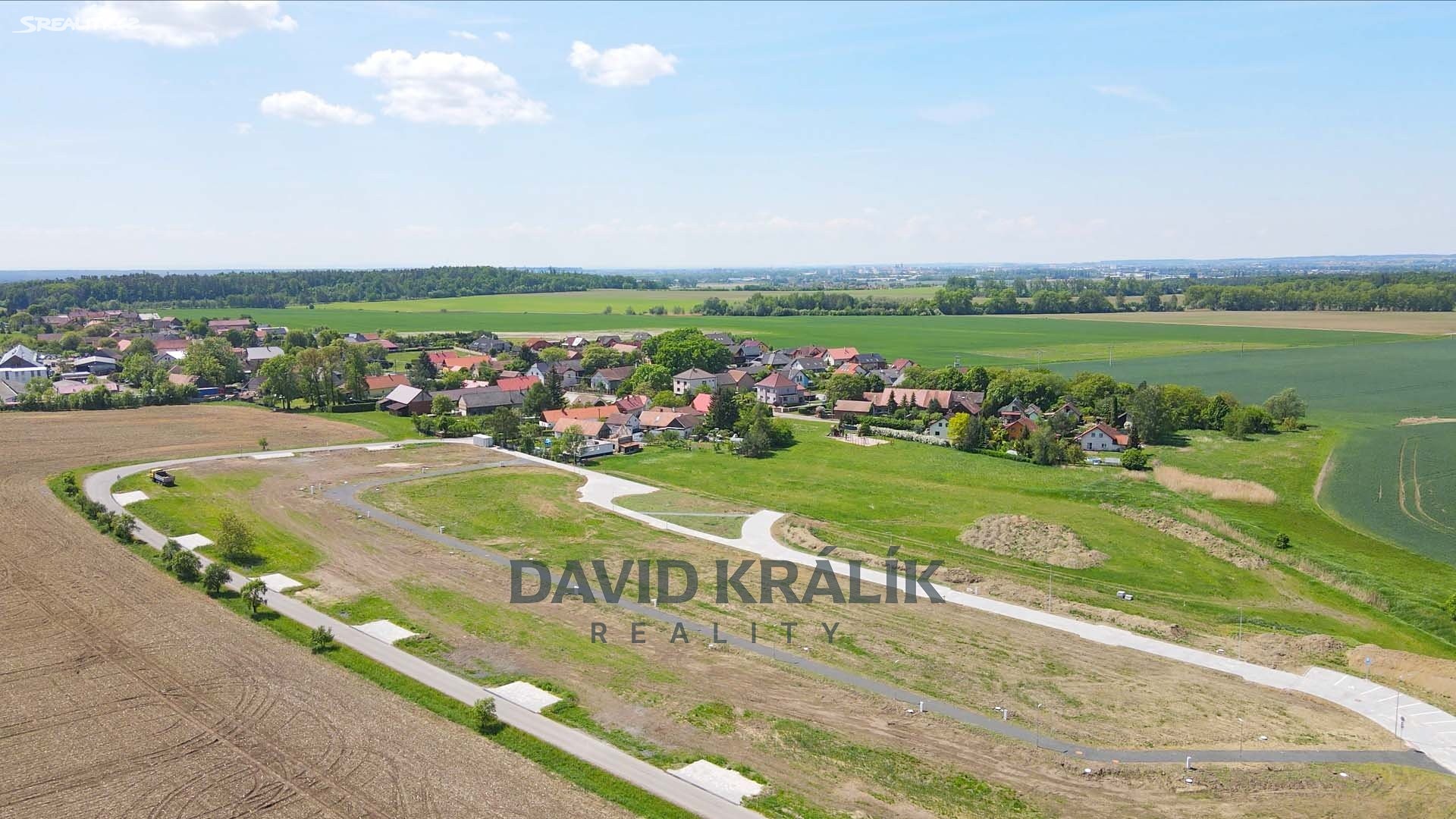 Prodej  stavebního pozemku 2 202 m², Divec, okres Hradec Králové