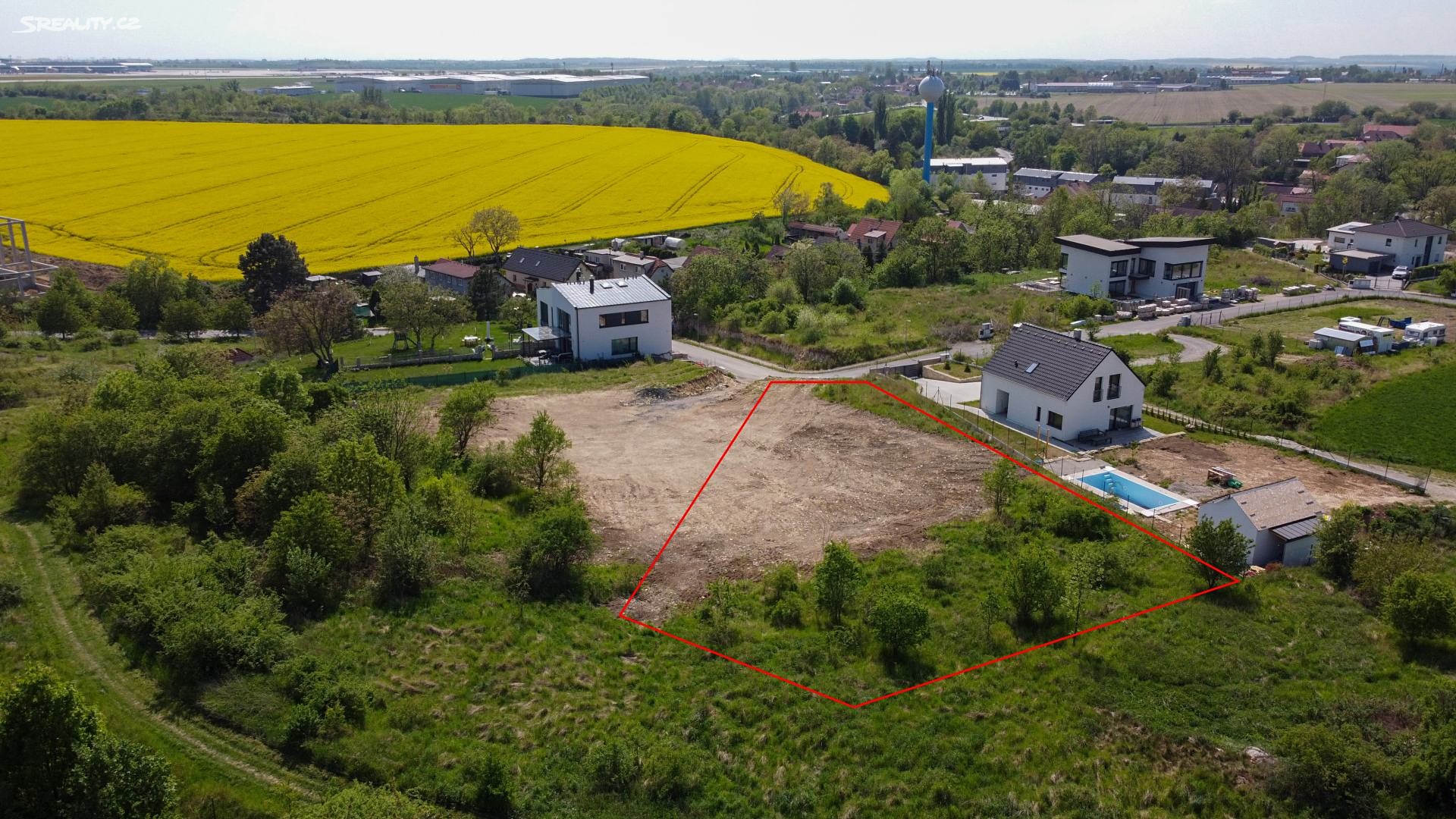 Prodej  stavebního pozemku 1 307 m², Tuchoměřice, okres Praha-západ