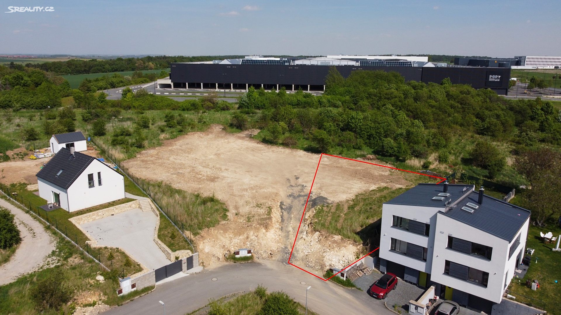 Prodej  stavebního pozemku 1 001 m², Tuchoměřice, okres Praha-západ