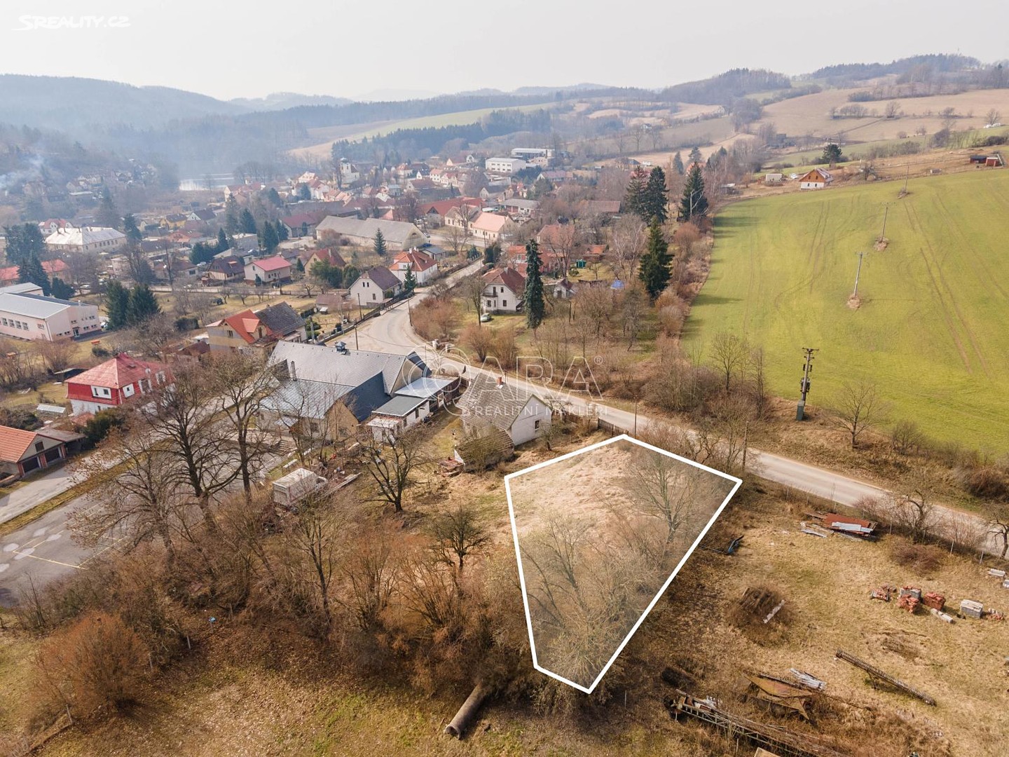 Prodej  stavebního pozemku 792 m², Benešovská, Postupice