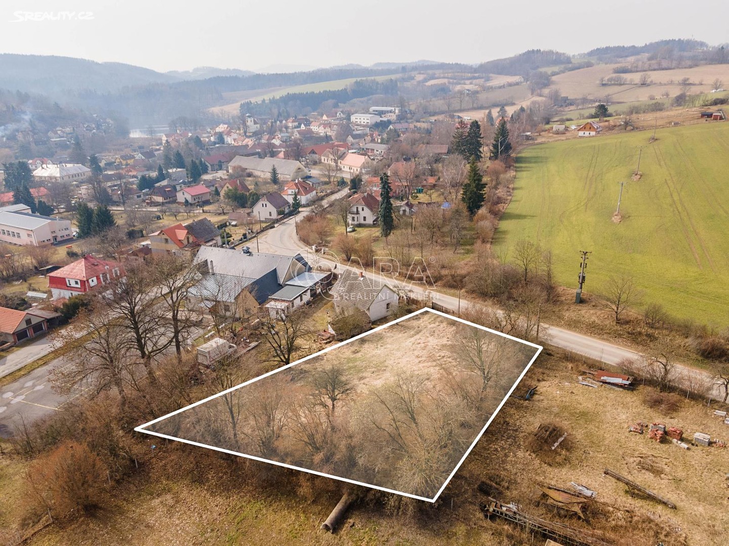 Prodej  stavebního pozemku 1 545 m², Benešovská, Postupice