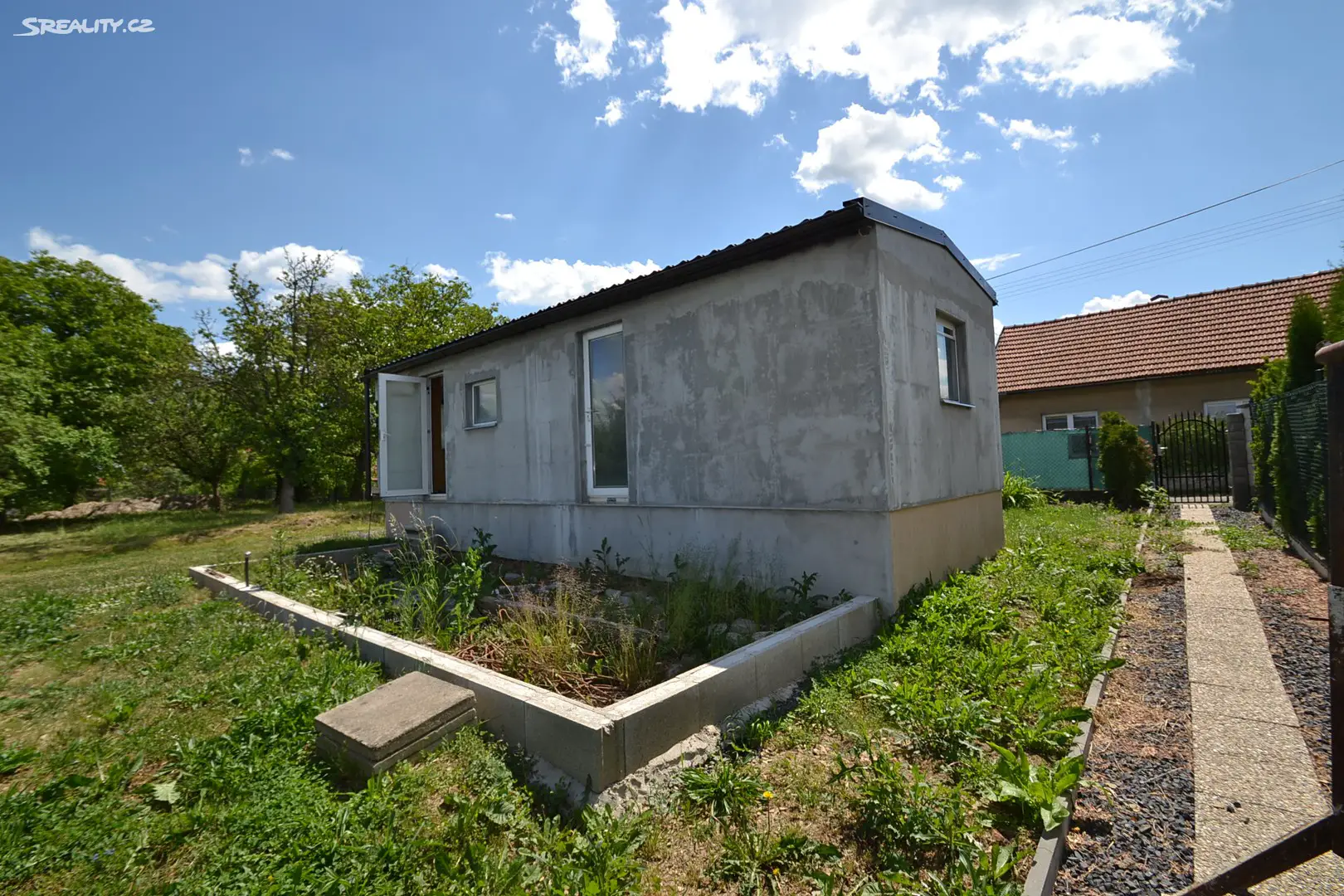 Prodej  stavebního pozemku 1 063 m², Dobročovice, okres Praha-východ