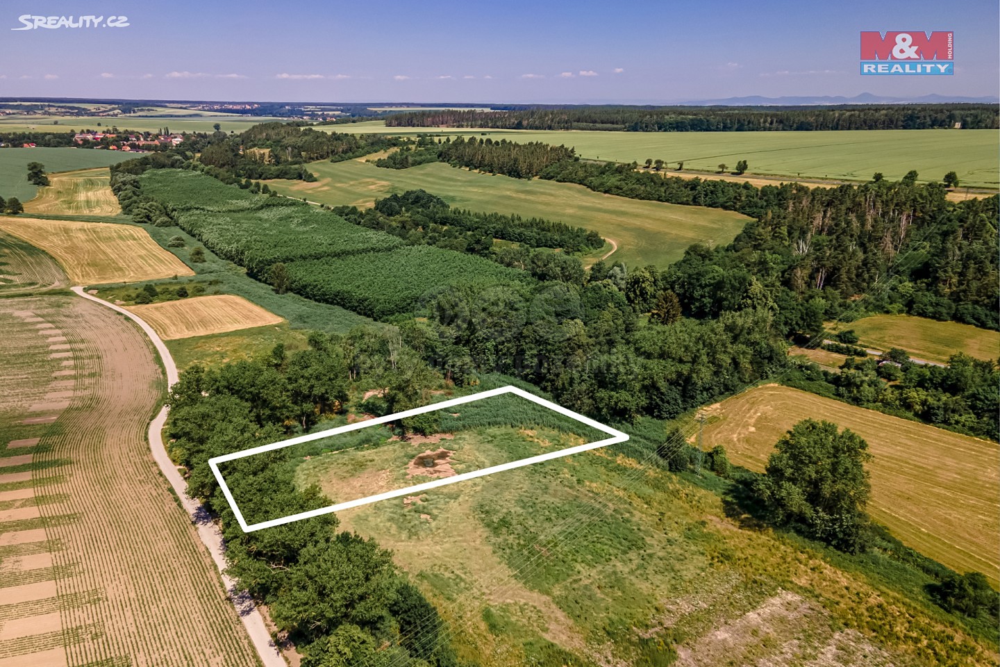 Prodej  pozemku 5 400 m², Kačice, okres Kladno