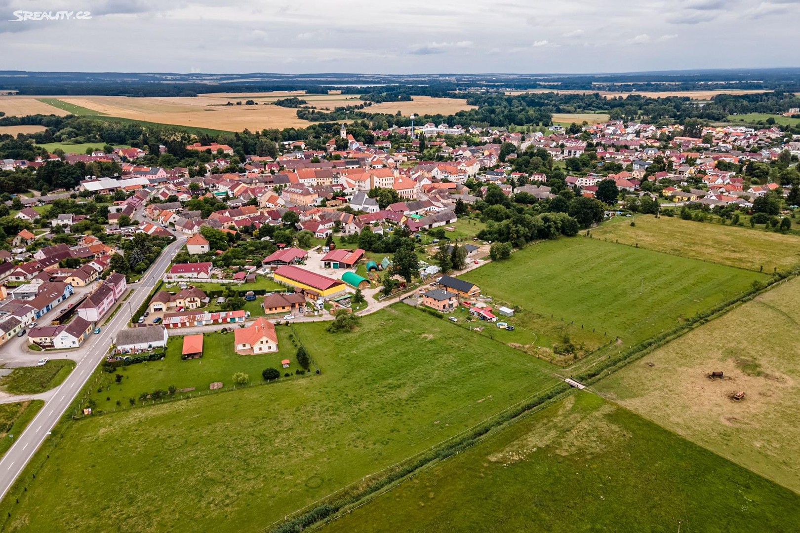 Prodej  stavebního pozemku 1 565 m², Tyršova, Lomnice nad Lužnicí