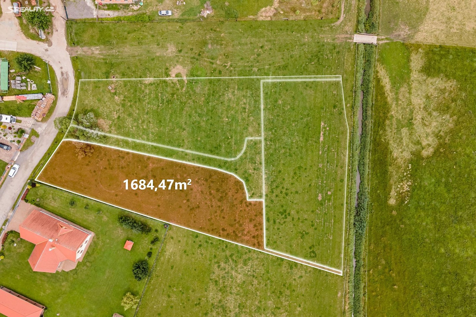 Prodej  stavebního pozemku 1 684 m², Tyršova, Lomnice nad Lužnicí