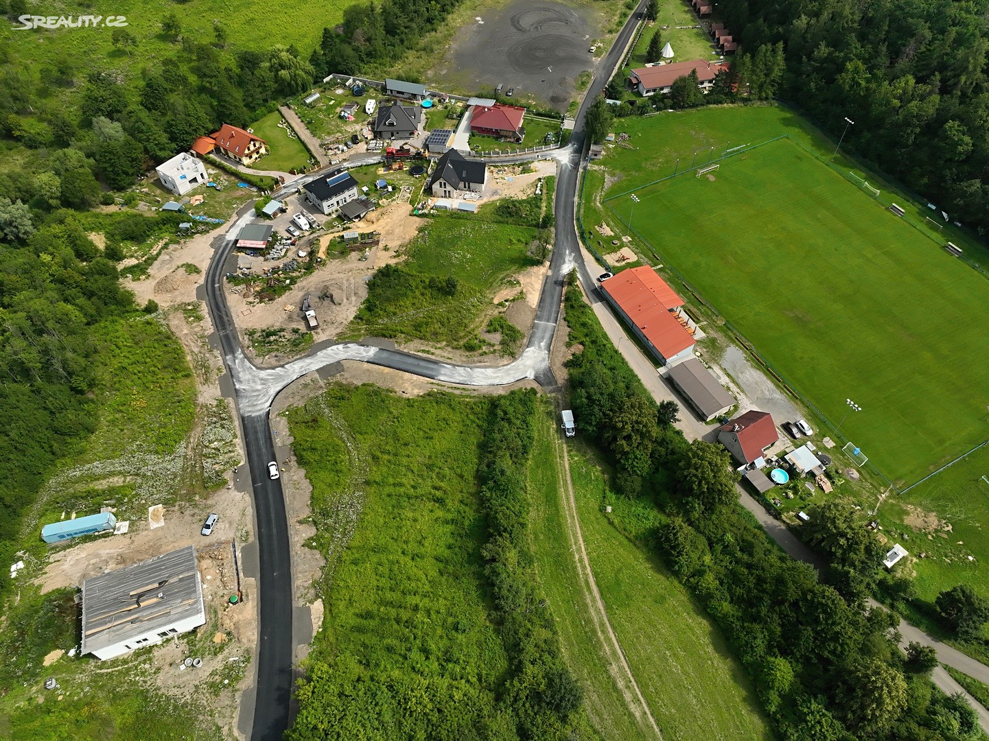 Prodej  stavebního pozemku 950 m², Pod Sv. Jiřím, Libušín