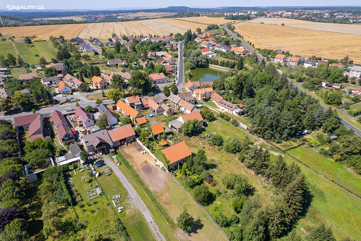 Prodej  stavebního pozemku 2 318 m², nám. 1. máje, Rynholec