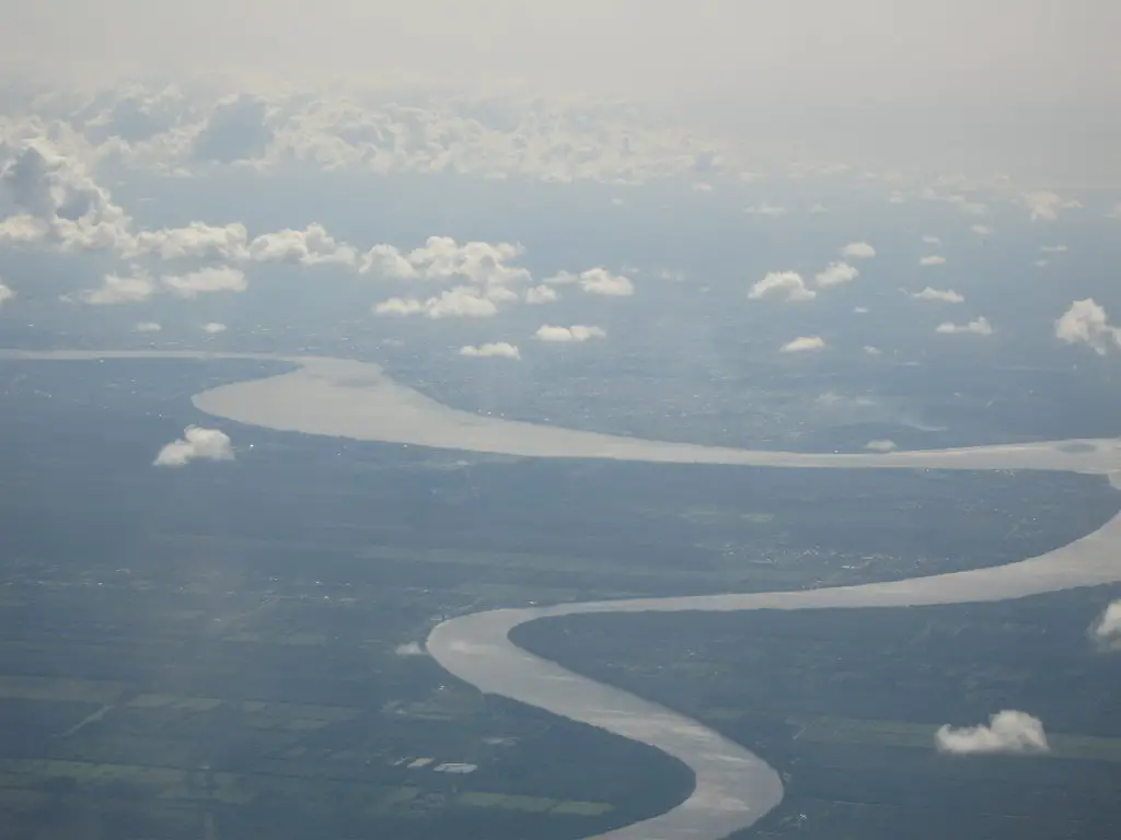 arial view of surinam, paramaribo just behind the river