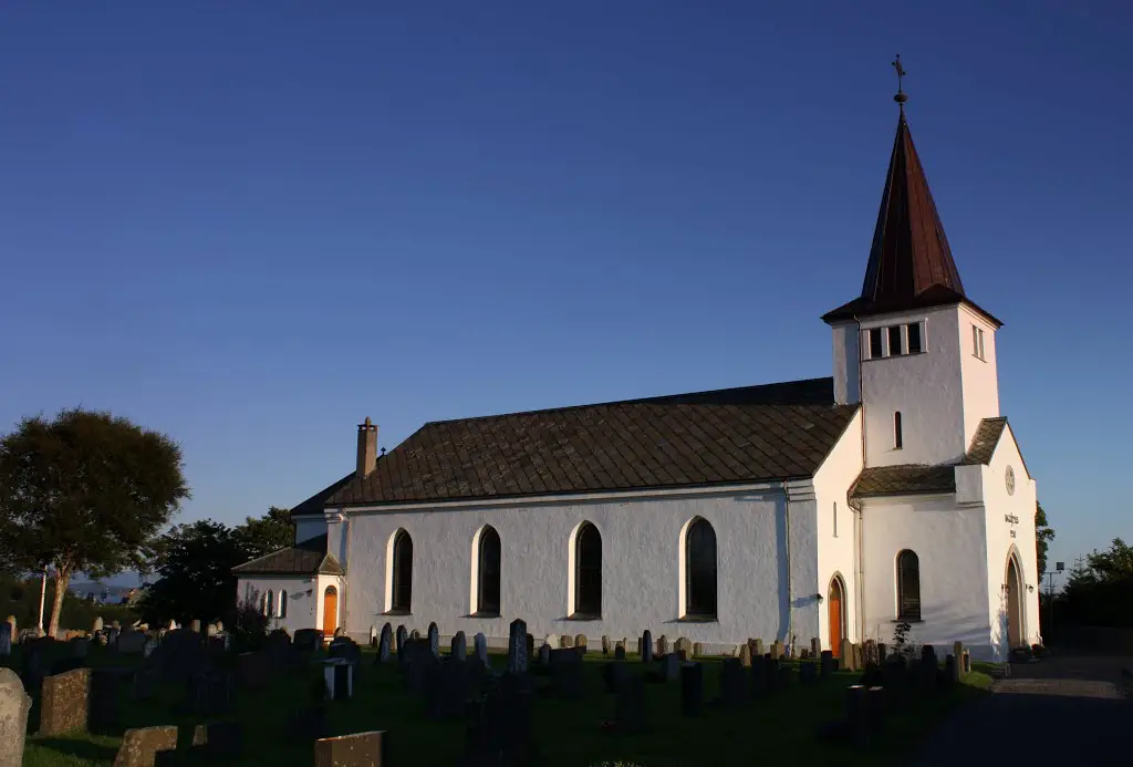 Beautiful Herdla church in august evening sunshine